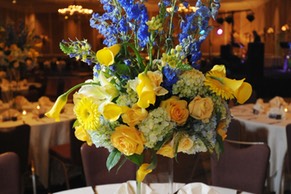 Blue and yellow centerpiece closeup. Nashville wedding & event flowers by Rose Hill Flowers.