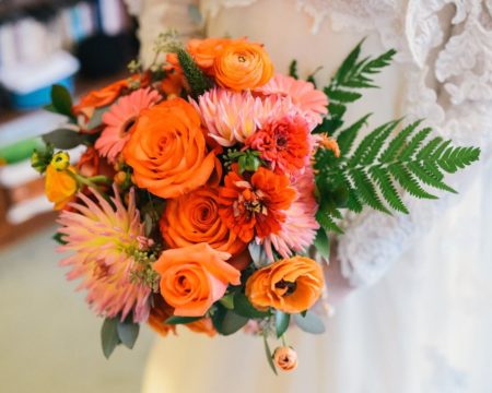 Pretty Modern Bridal Bouquet of orange and pink flowers