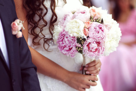 Modern style bride bouquet with peonies 