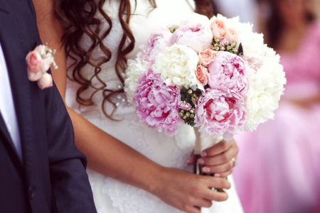 Modern style bride bouquet with peonies