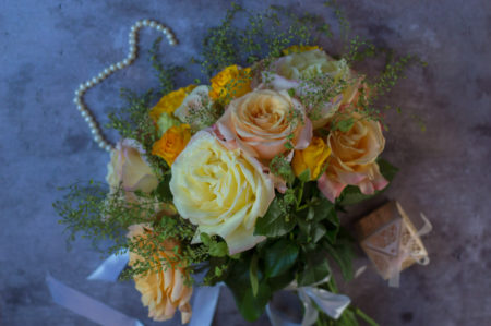 Victorian style wedding bouquet with yellow and peach