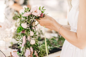 Woman creating wedding flower crown