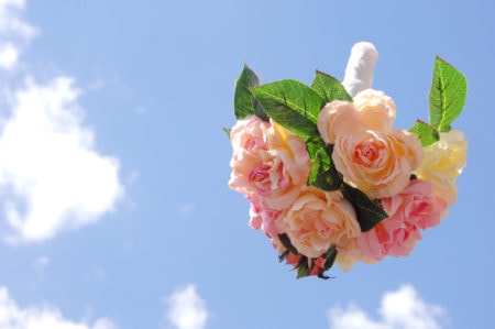 bouquet toss in the sky