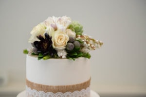 Collection of fresh flowers on a wedding cake